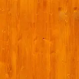 Orange gebeiztes Birken-Weichholz mit sichtbarer Maserung und Astlöchern.